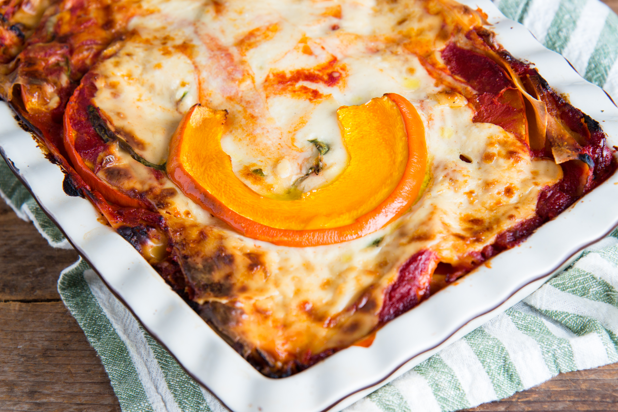 Pumpkin lasagna with spinach and tomato sauce