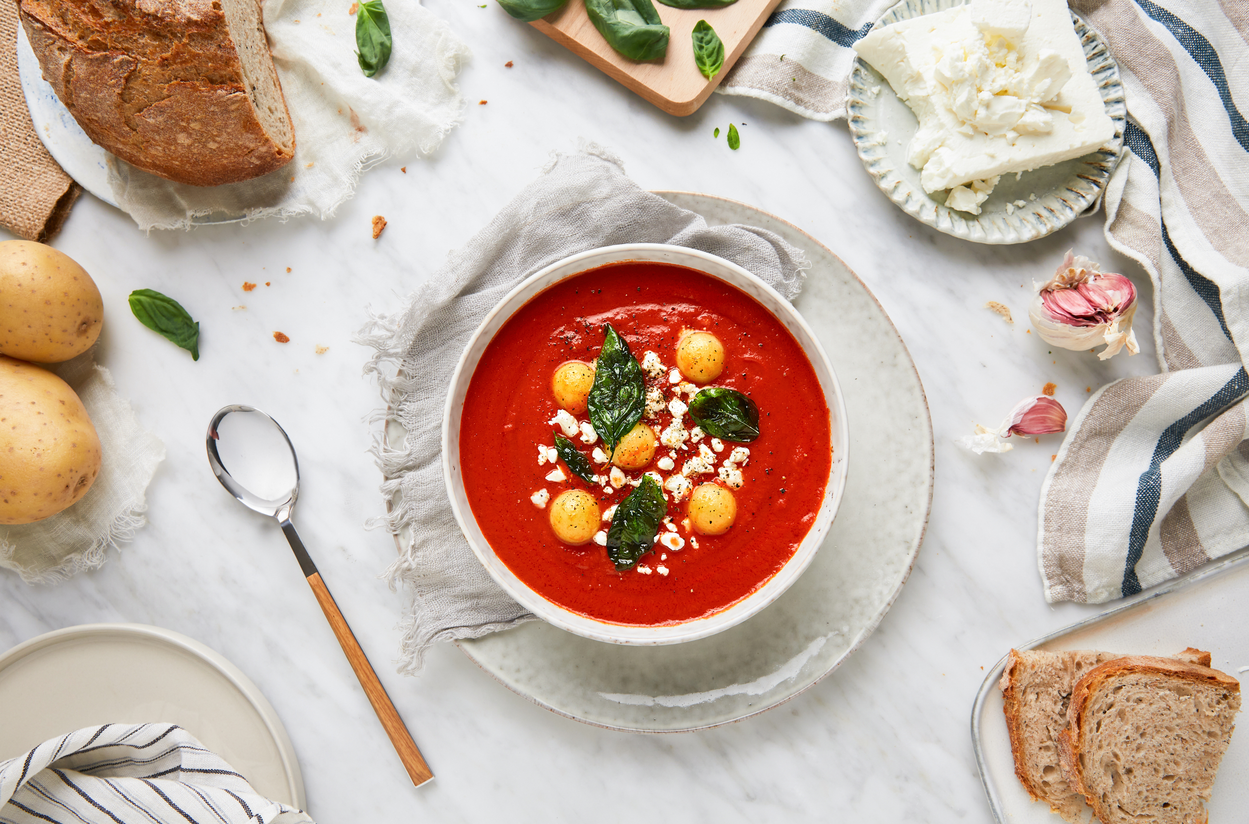 Tomato soup with potato spheres and fried basil