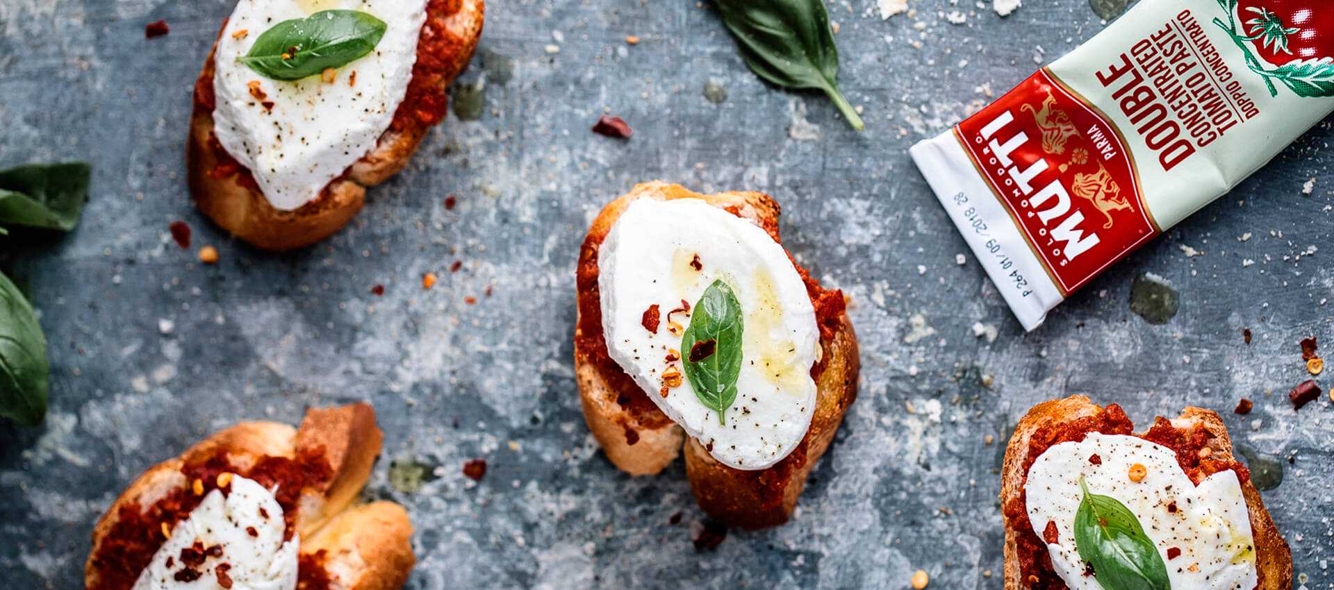 Tomato bruschetta with anchovy and mozzarella