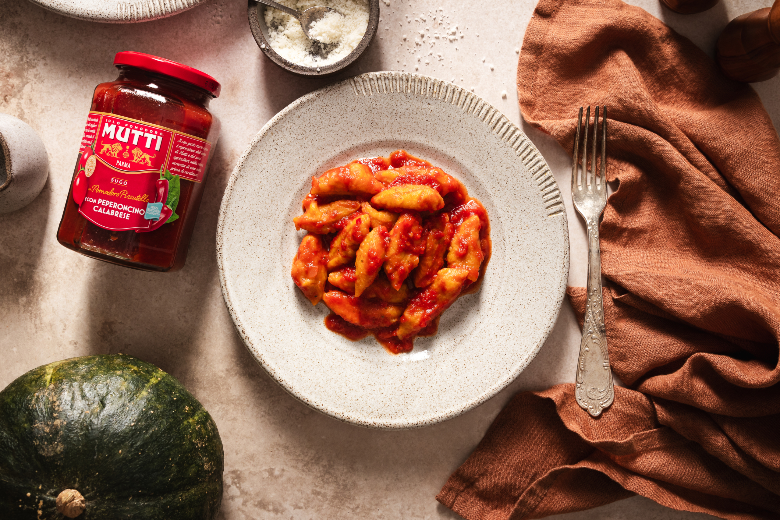 Pumpkin gnocchi with spicy tomato sauce