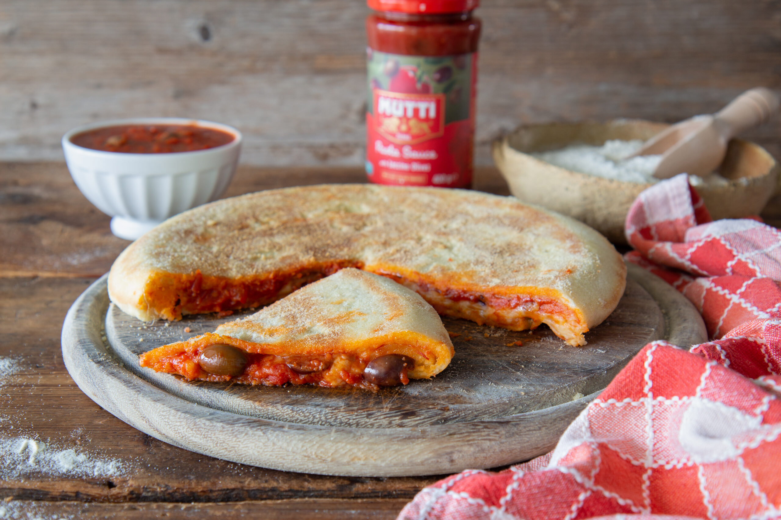 Stuffed Focaccia with Olives Tomato Sauce | Mutti Recipe