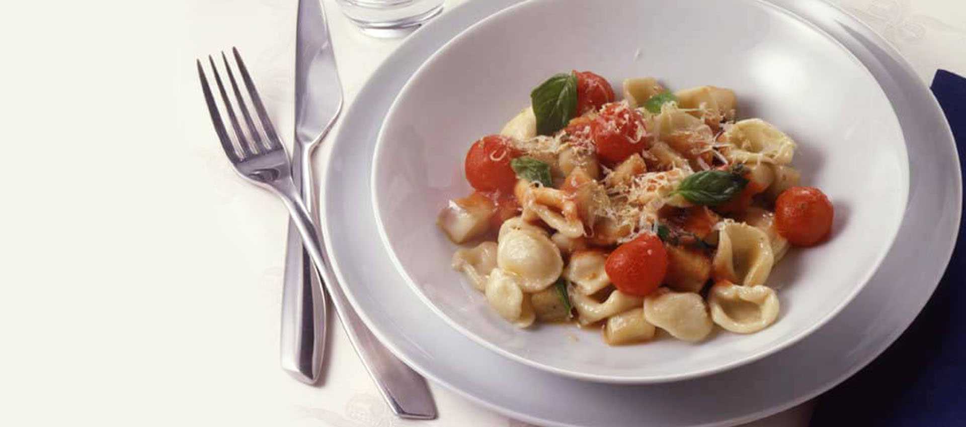 Tomato orecchiette with aubergine and ricotta cheese