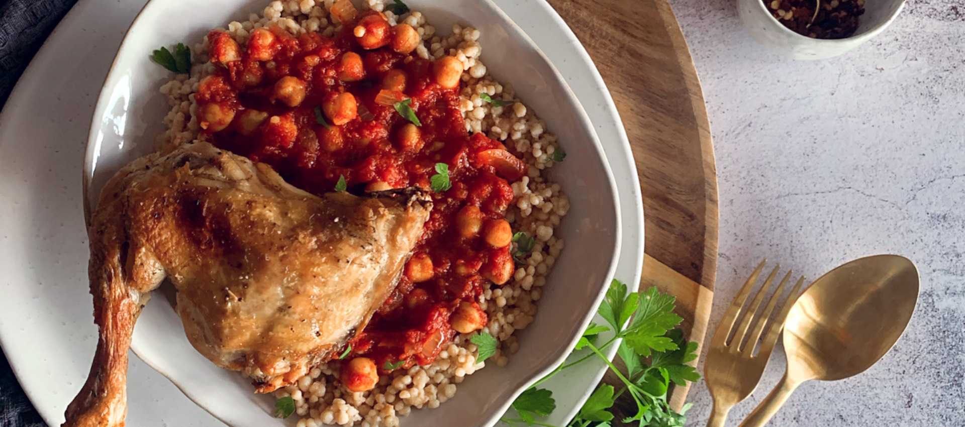 Palestinian maftoul with chopped tomatoes