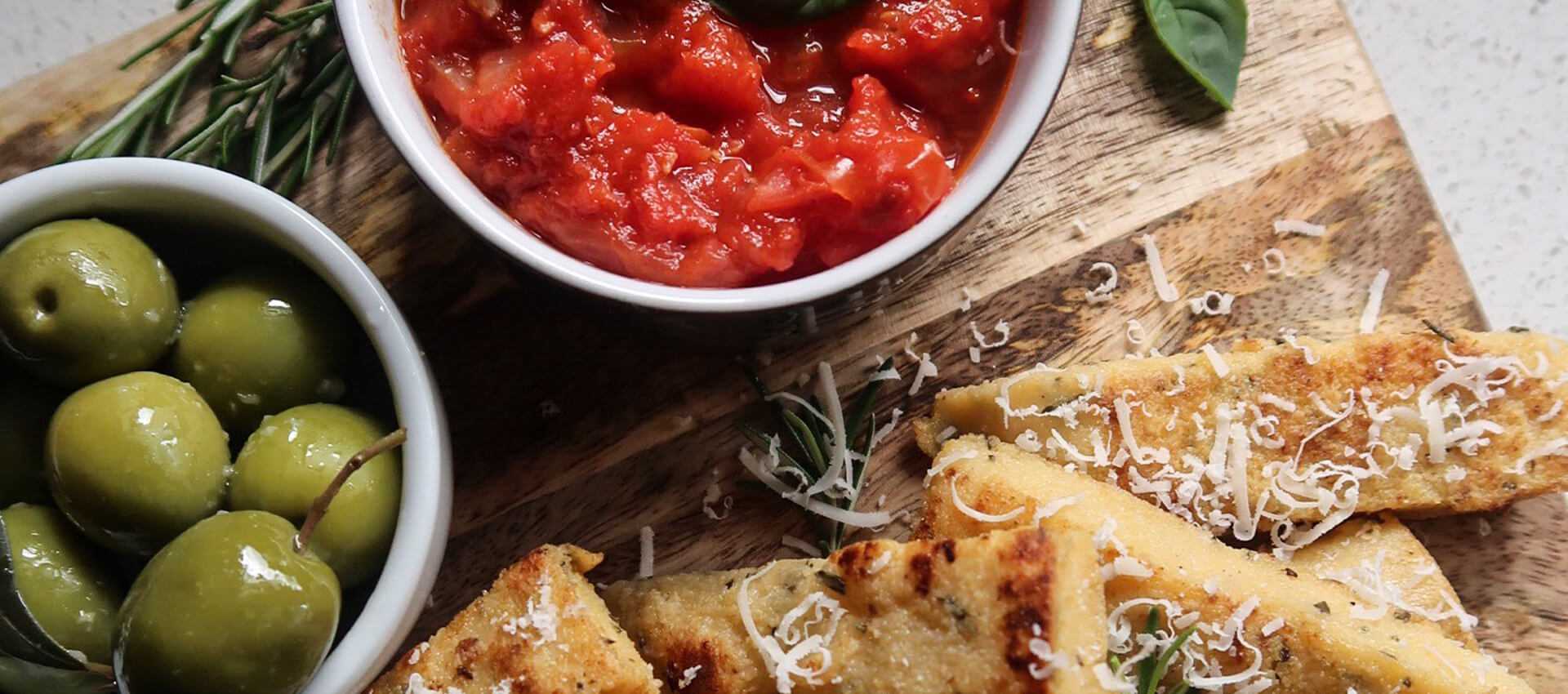 Rosemary and Parmesan Polenta Chips with Spicy Dipping Sauce