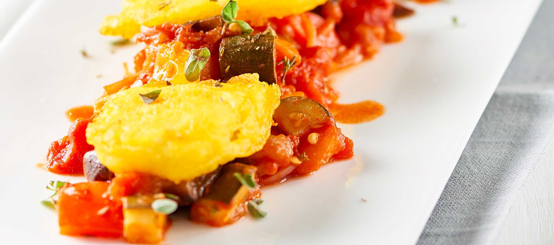 Baccala in pastella con pomodori pelati