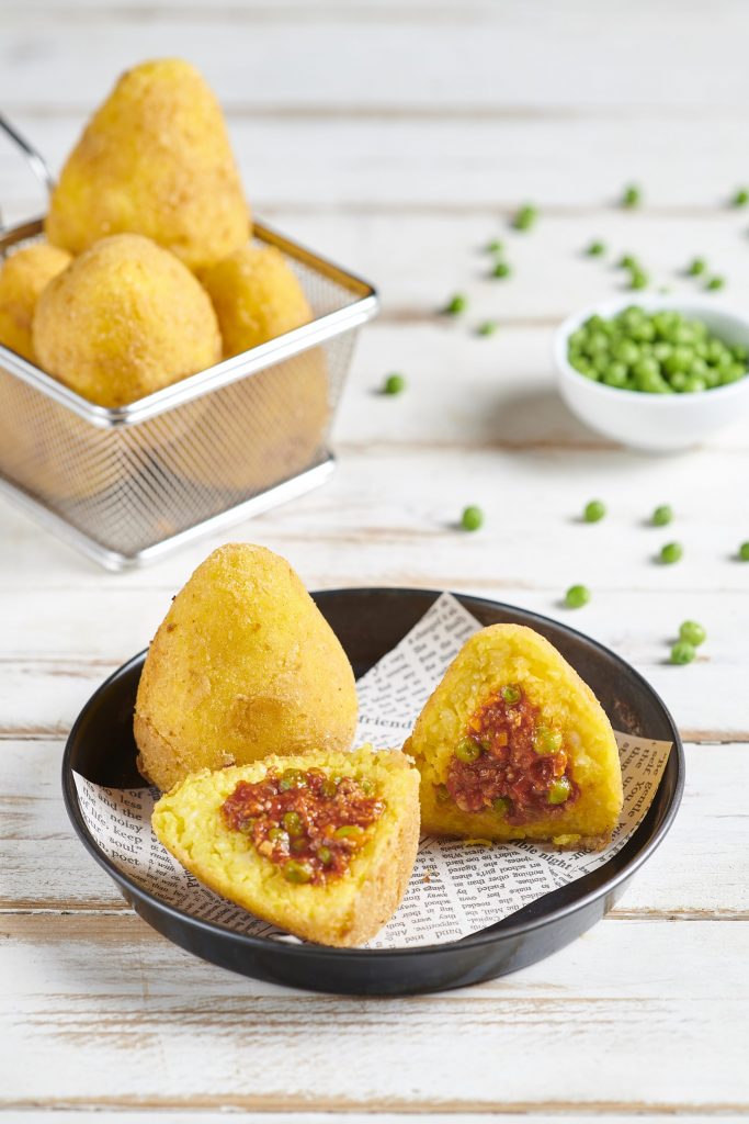 Arancini di riso con piselli Arancini di riso con piselli